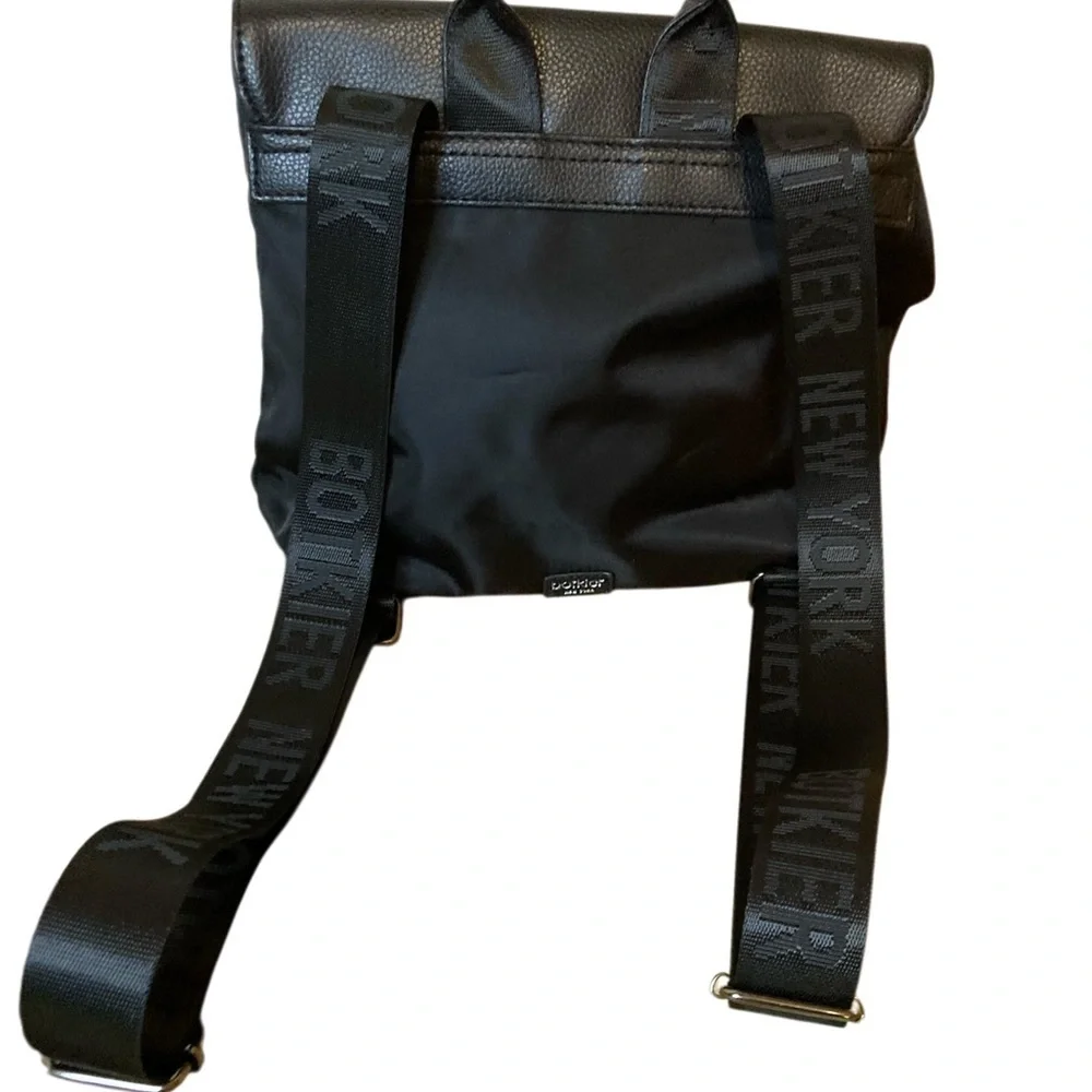 NWT Botkier mini trigger NYLON BACKPACK BLACK WITH GUITAR LIKE LOGO STRAPS